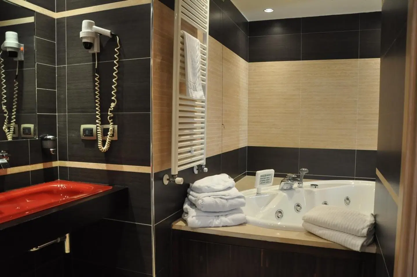 Grand Hotel Olimpo Badezimmer