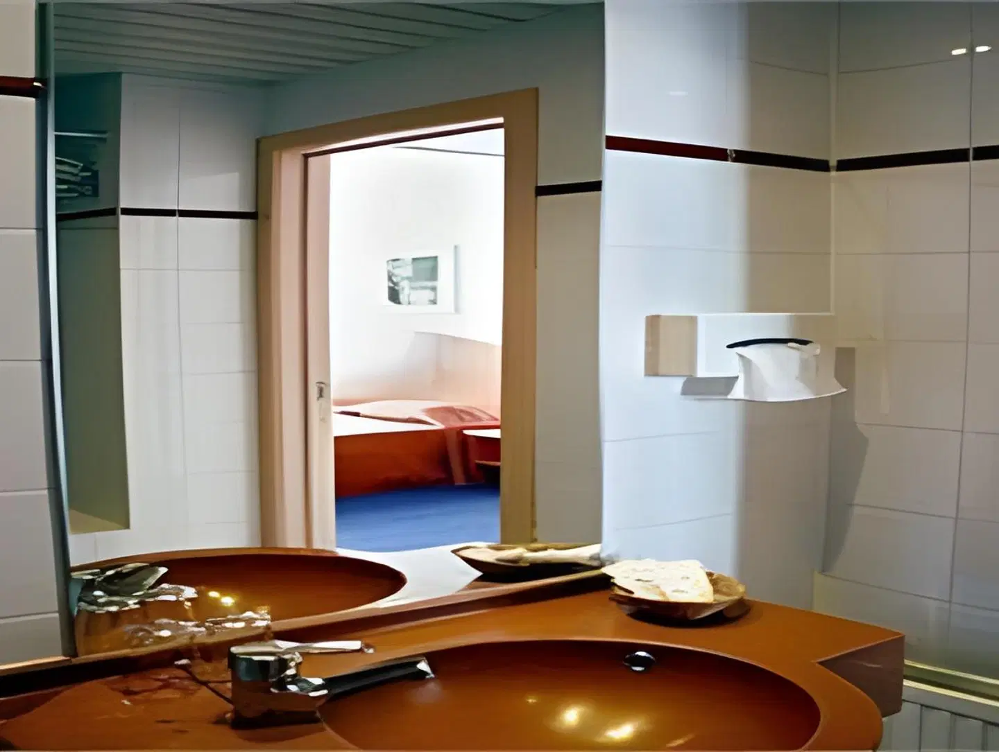 Aris Grand Place Hotel Badezimmer