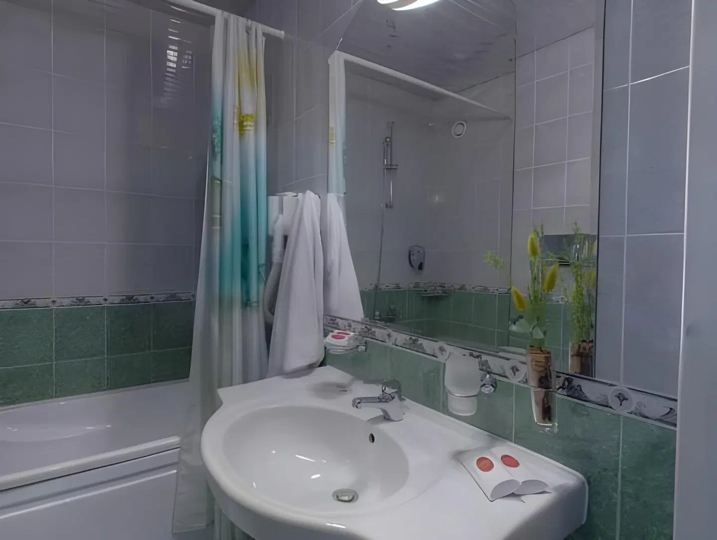 Reverence Hotel Badezimmer