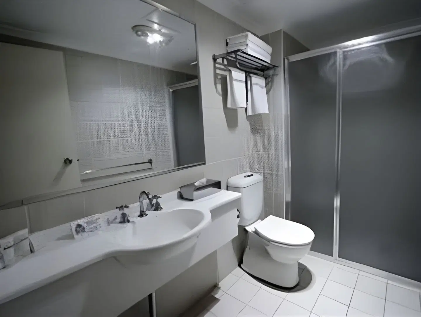 Carlyle Suites & Apartments Badezimmer