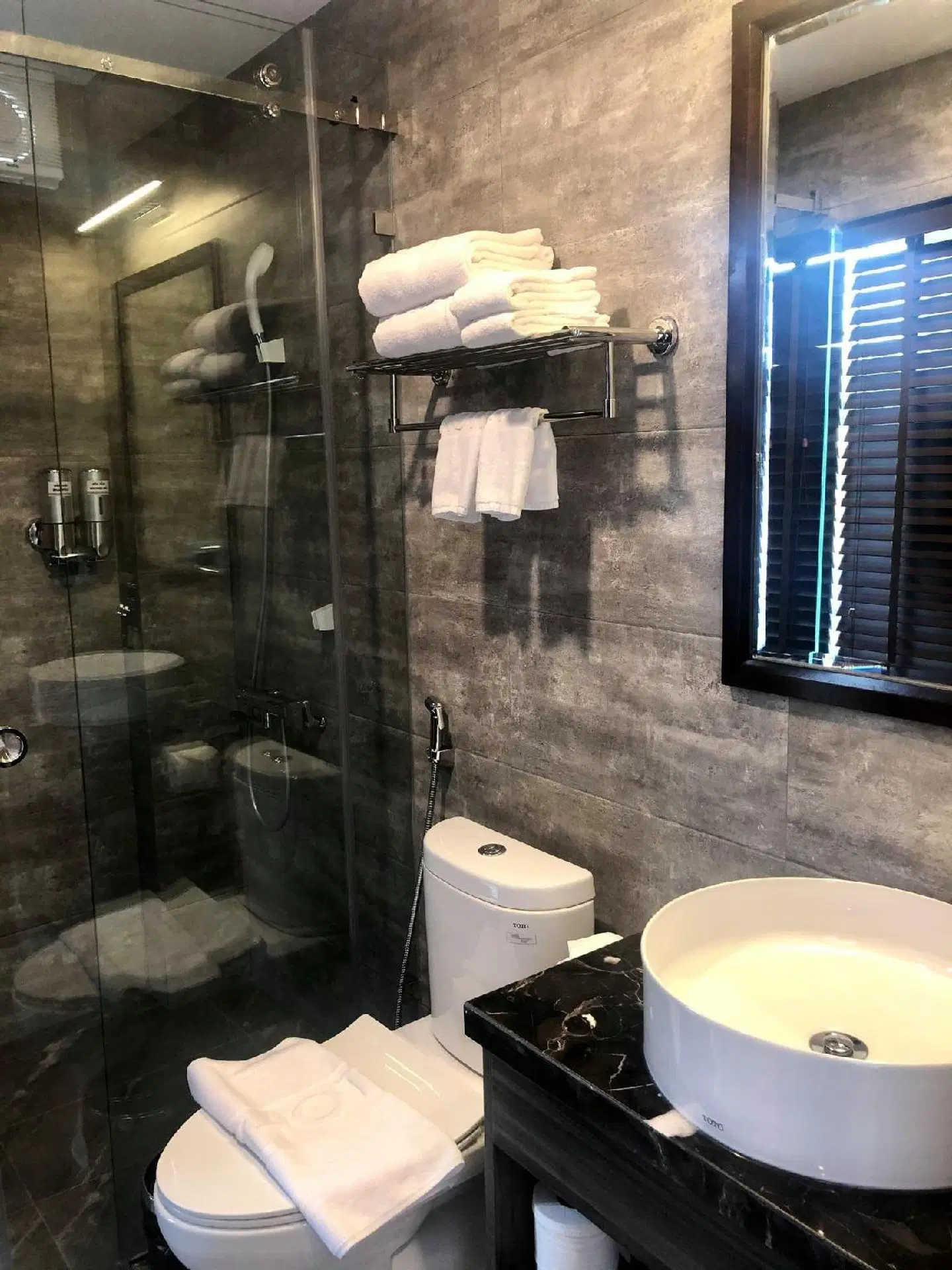 3T Hotel & Travel Badezimmer