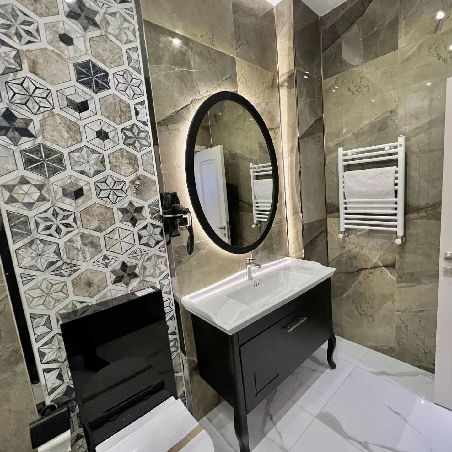MQ Hotel Suites Badezimmer