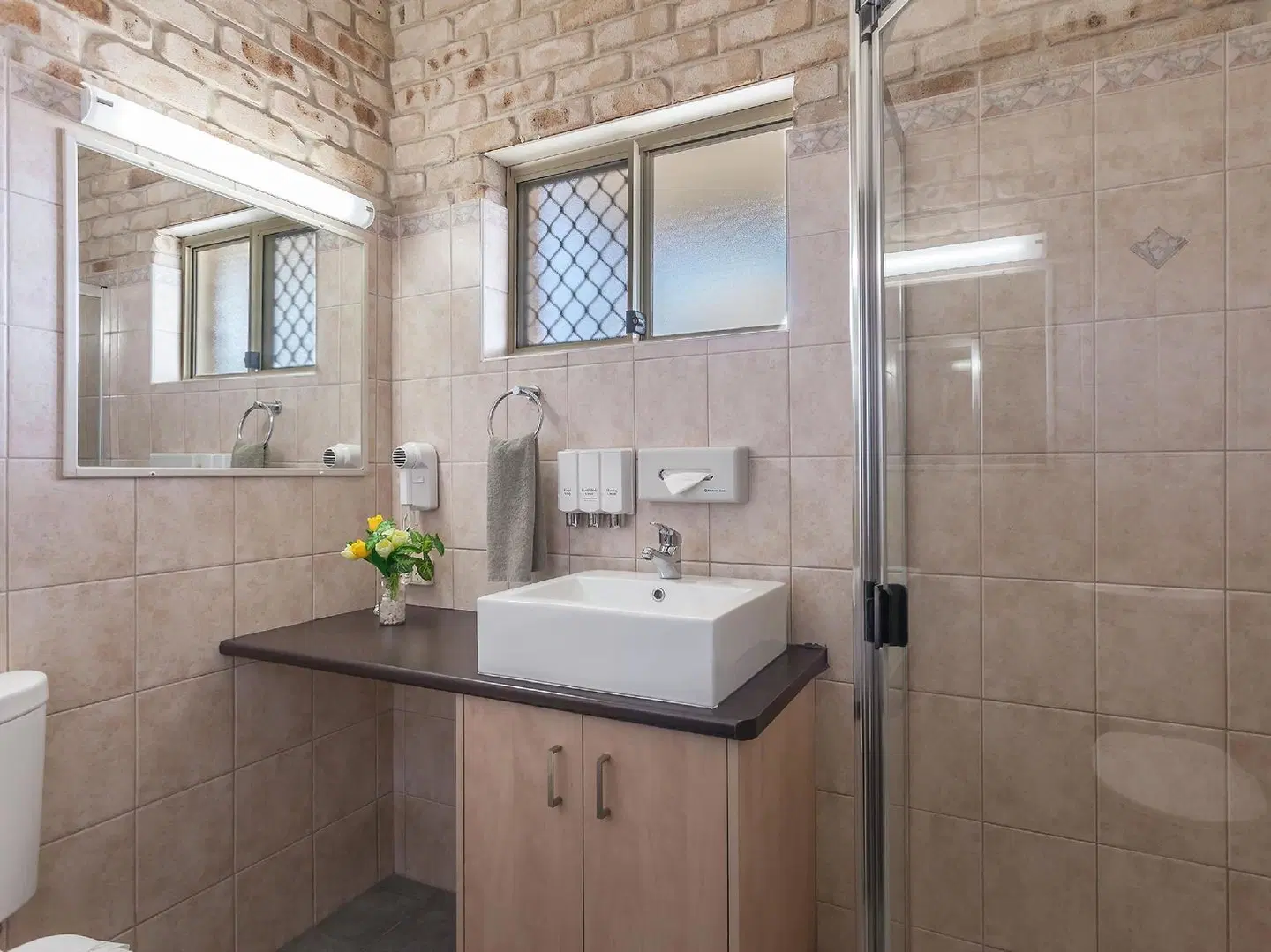 Highlander Motor Inn Badezimmer