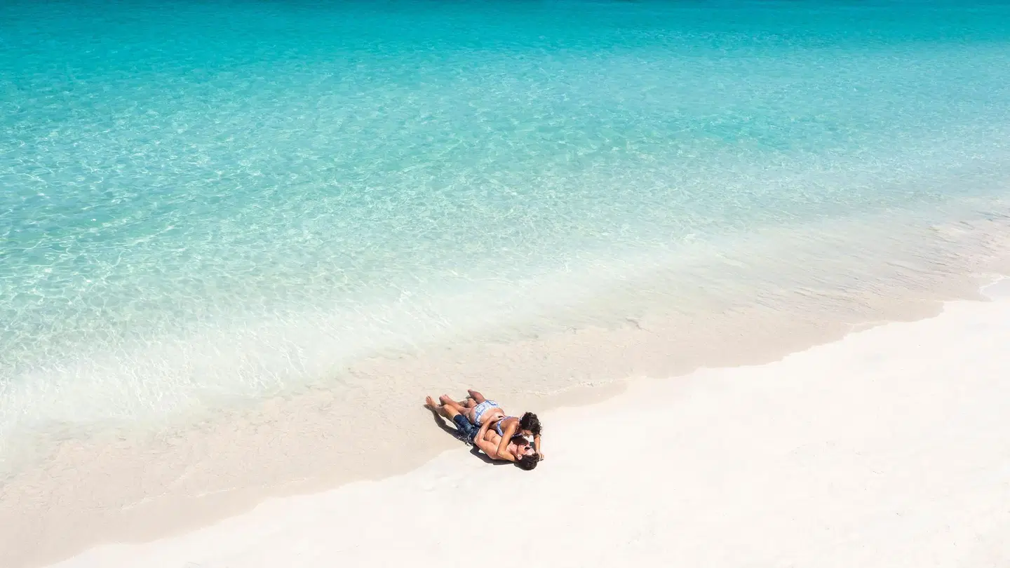 Couples Swept Away Strand