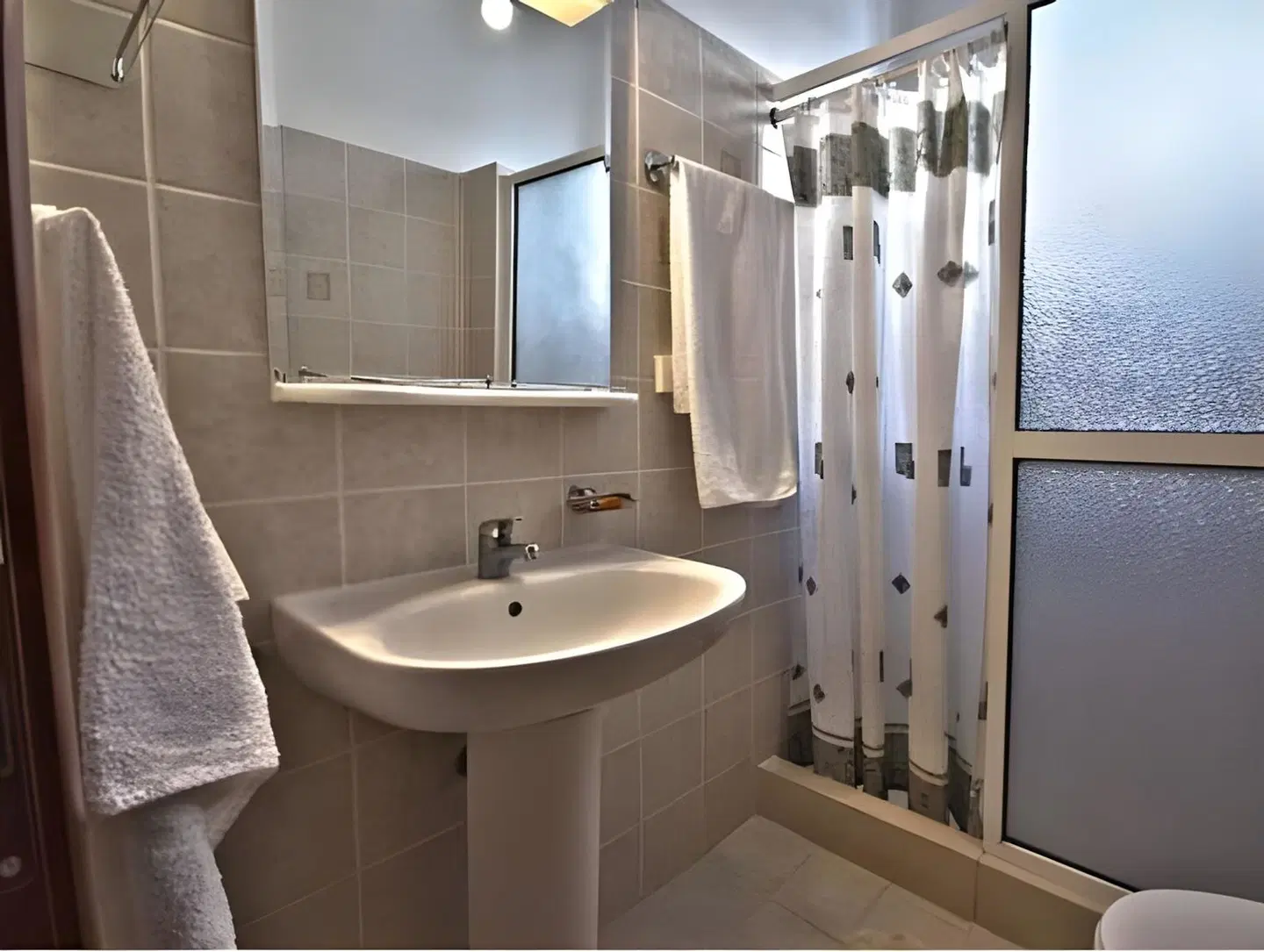 Ikaros Apartments Badezimmer