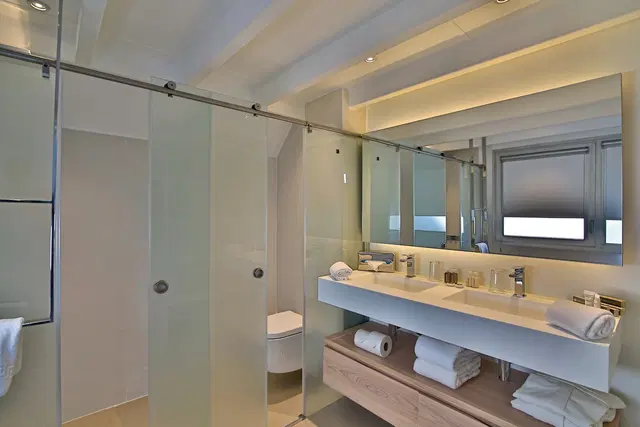 Mahogany Hôtel Résidence & Spa Badezimmer