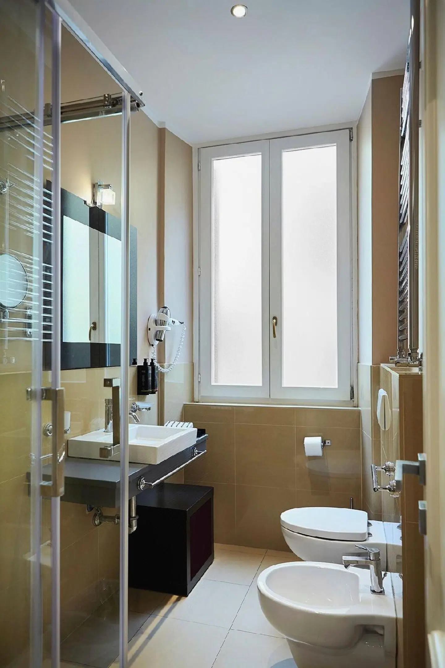 Trianon Borgo Pio Aparthotel Badezimmer