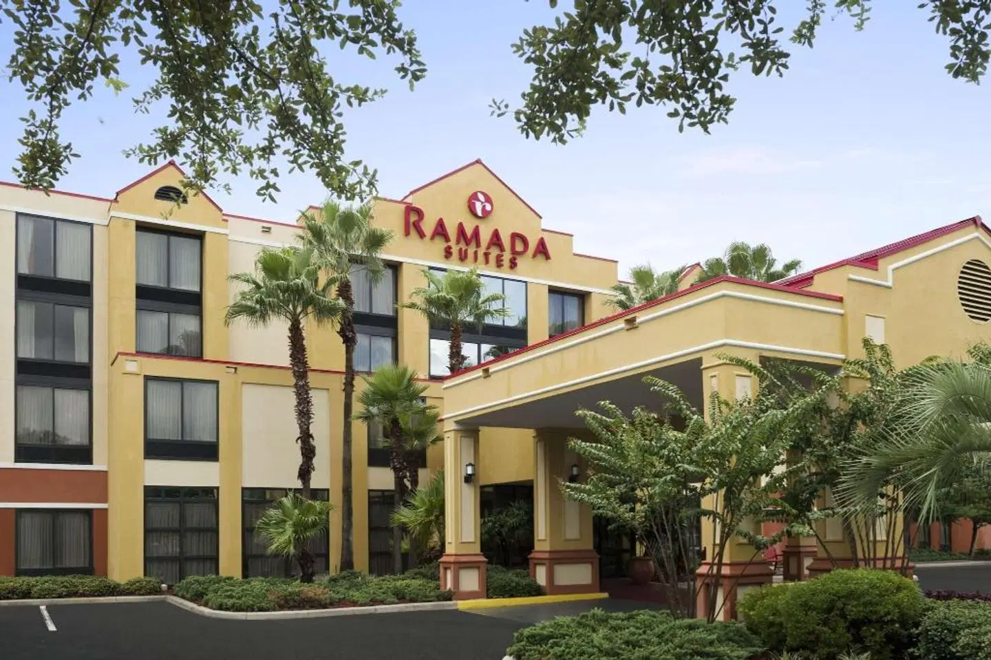 Ramada by Wyndham Suites Orlando Airport EXTERIOR