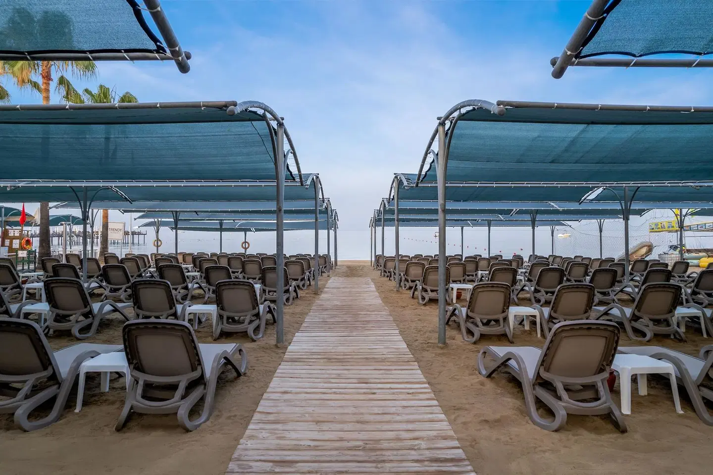 Trendy Palm Beach Adults only Strand