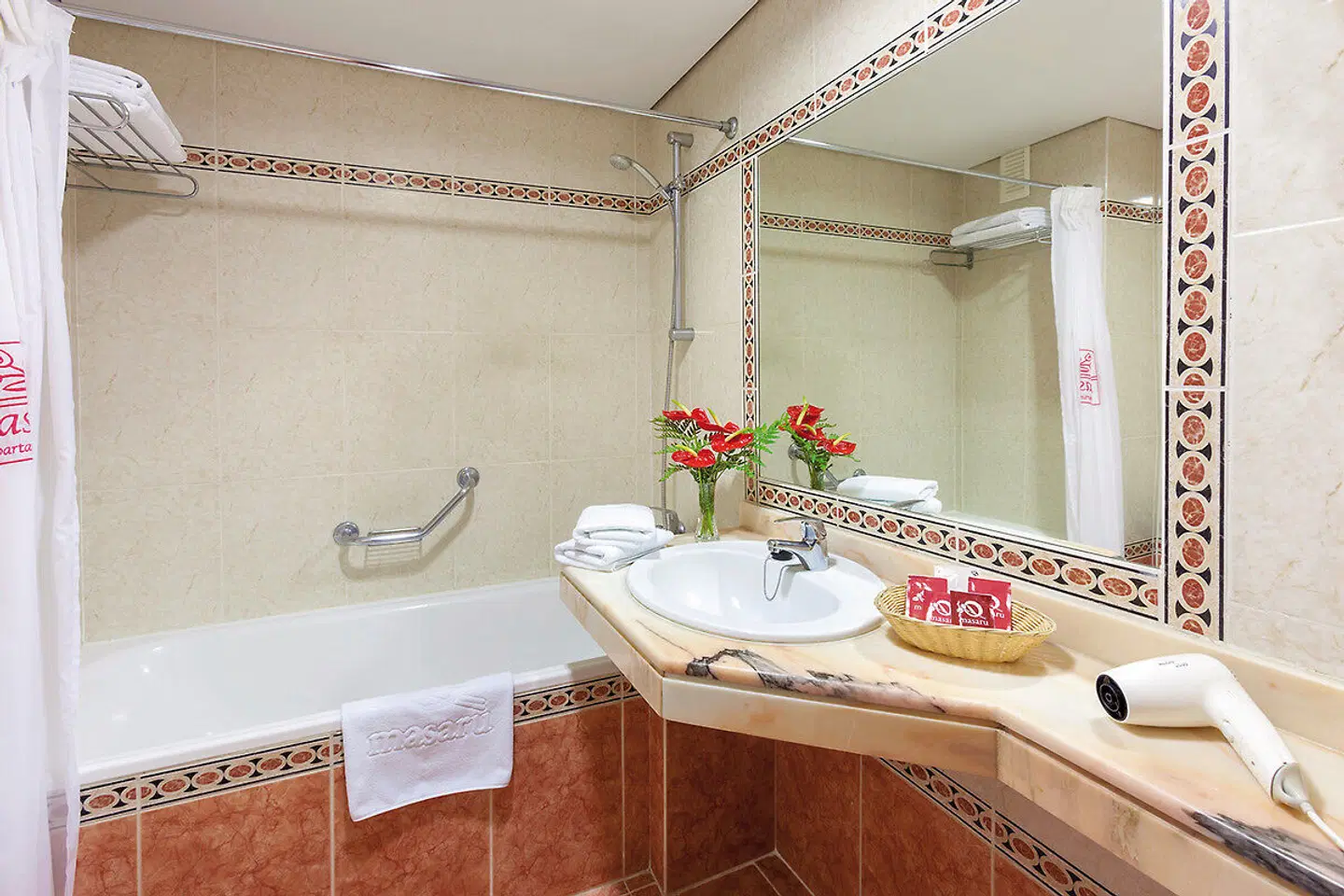 Apartamentos Masaru Badezimmer