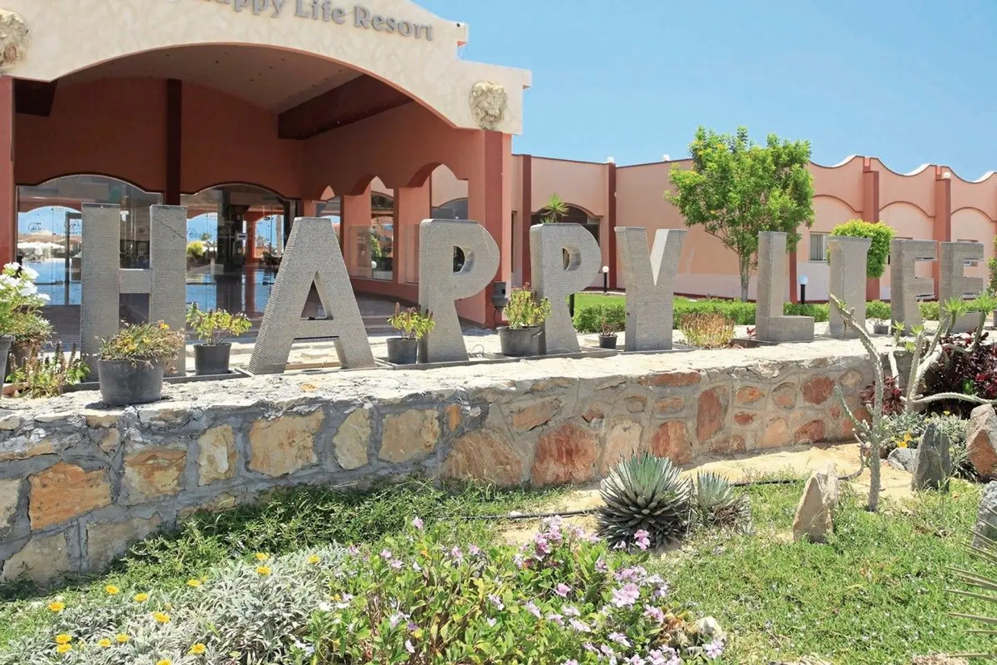 Three Corners Happy Life Beach Resort Terrasse