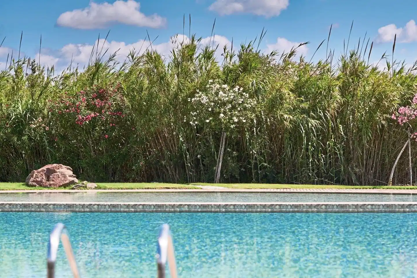 Baia di Chia Resort Sardinia, Curio Collection by Hilton POOL