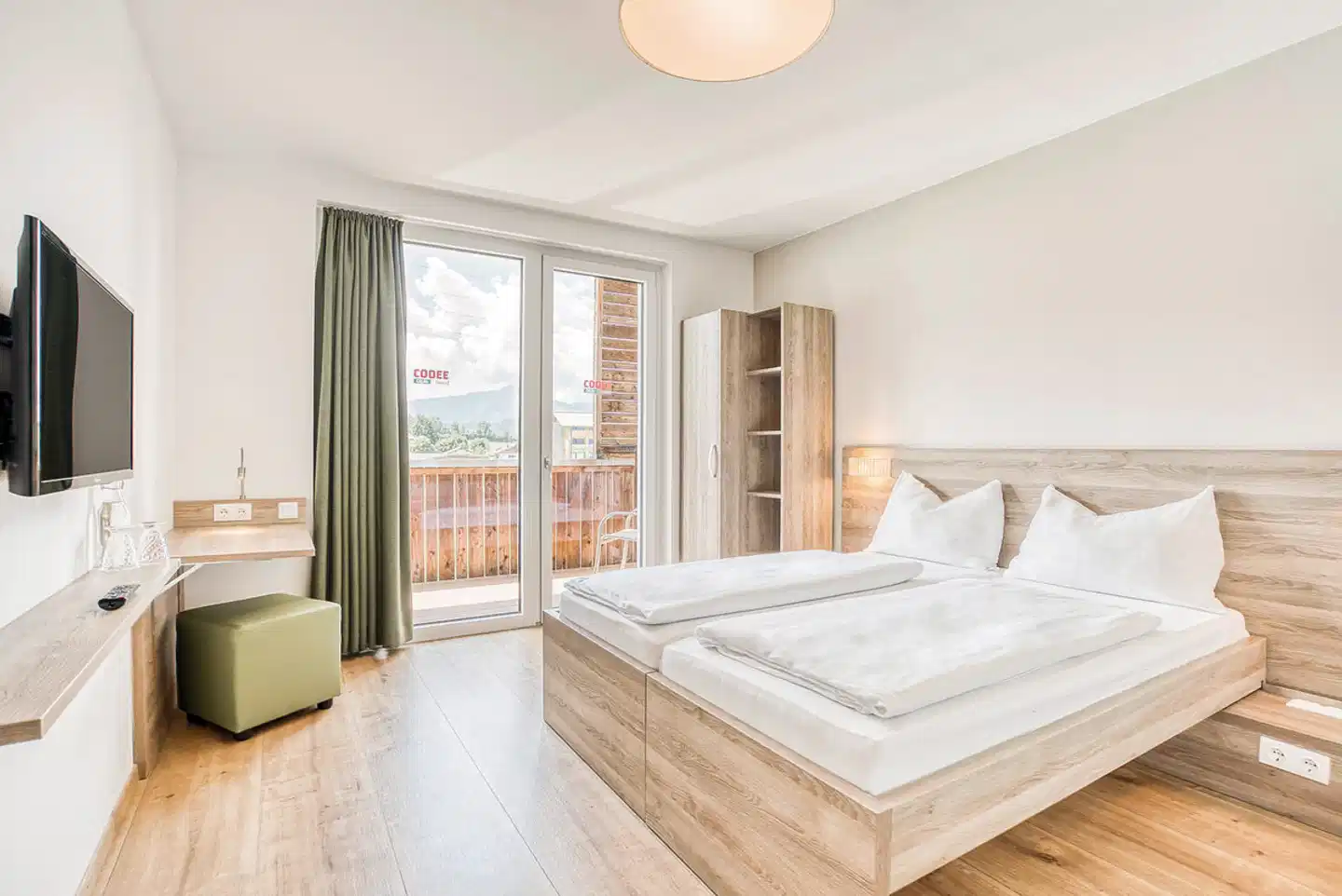 COOEE alpin Hotel Kitzbüheler Alpen Wohnbeispiel