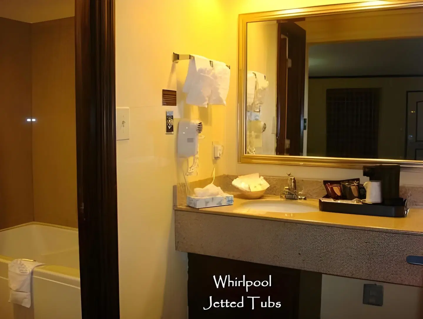 Quarters Inn & Suites Badezimmer