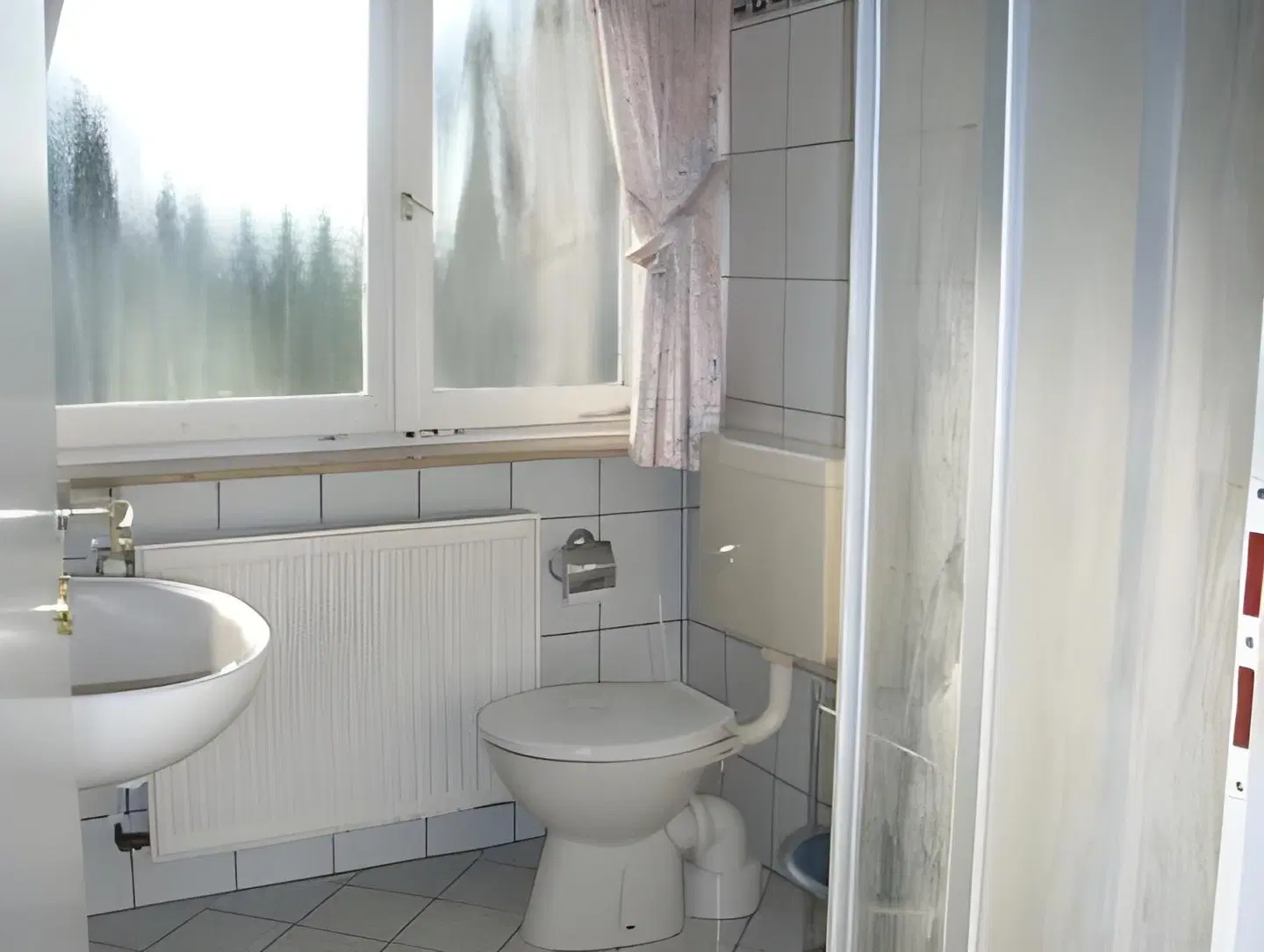 Hotel Schlößmann Garni Badezimmer