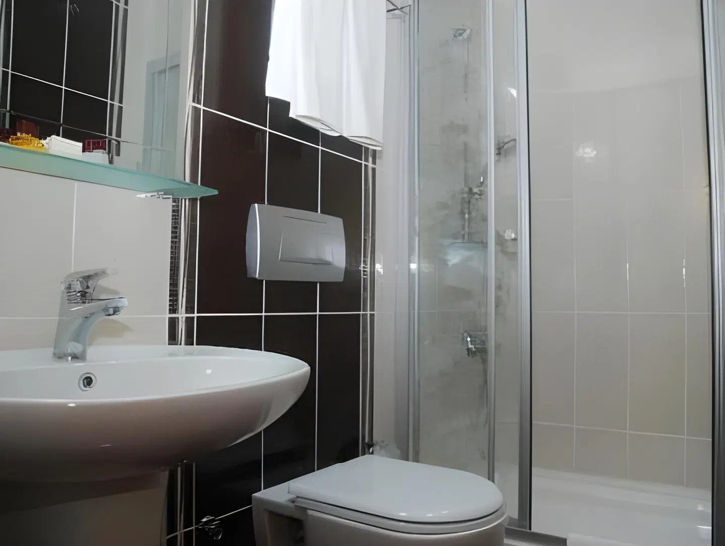 Grand Rosa Hotel Badezimmer