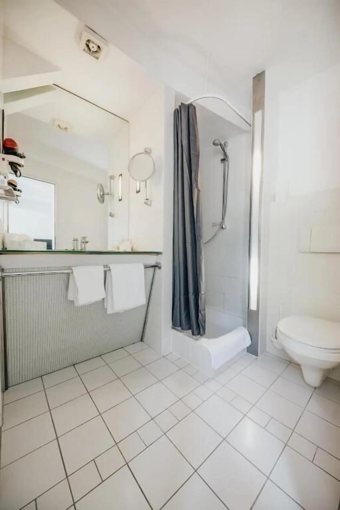 Magni Boutique Hotel Badezimmer