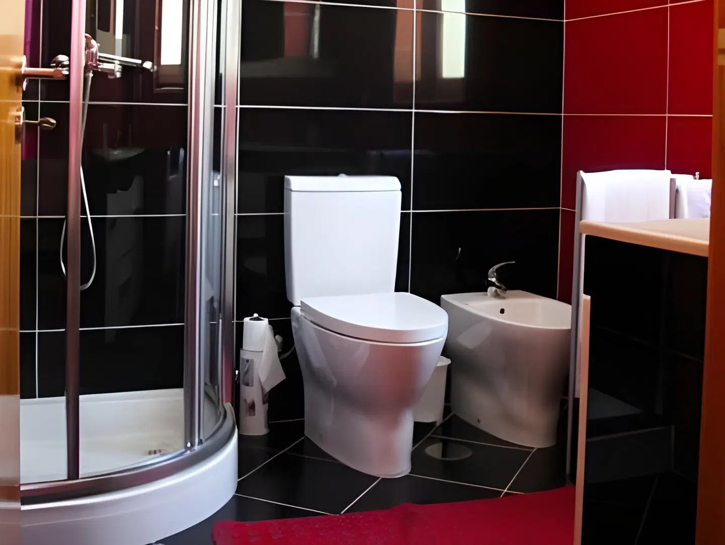 Encostas da Torre Badezimmer