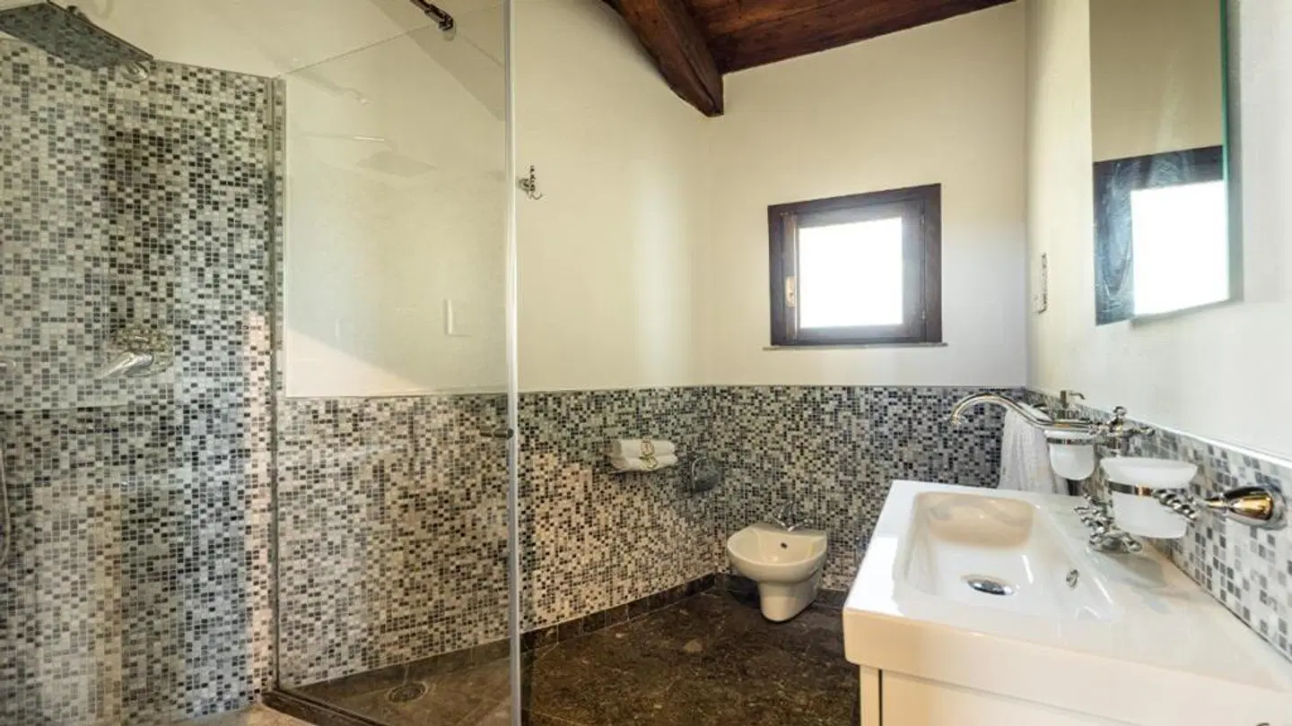 Villa del Gattopardo Suites & Spa Badezimmer