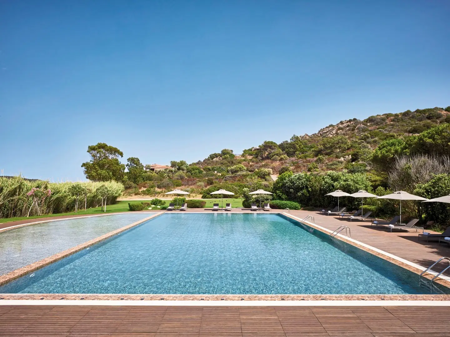 Baia di Chia Resort Sardinia, Curio Collection by Hilton OUTDOOR_POOL