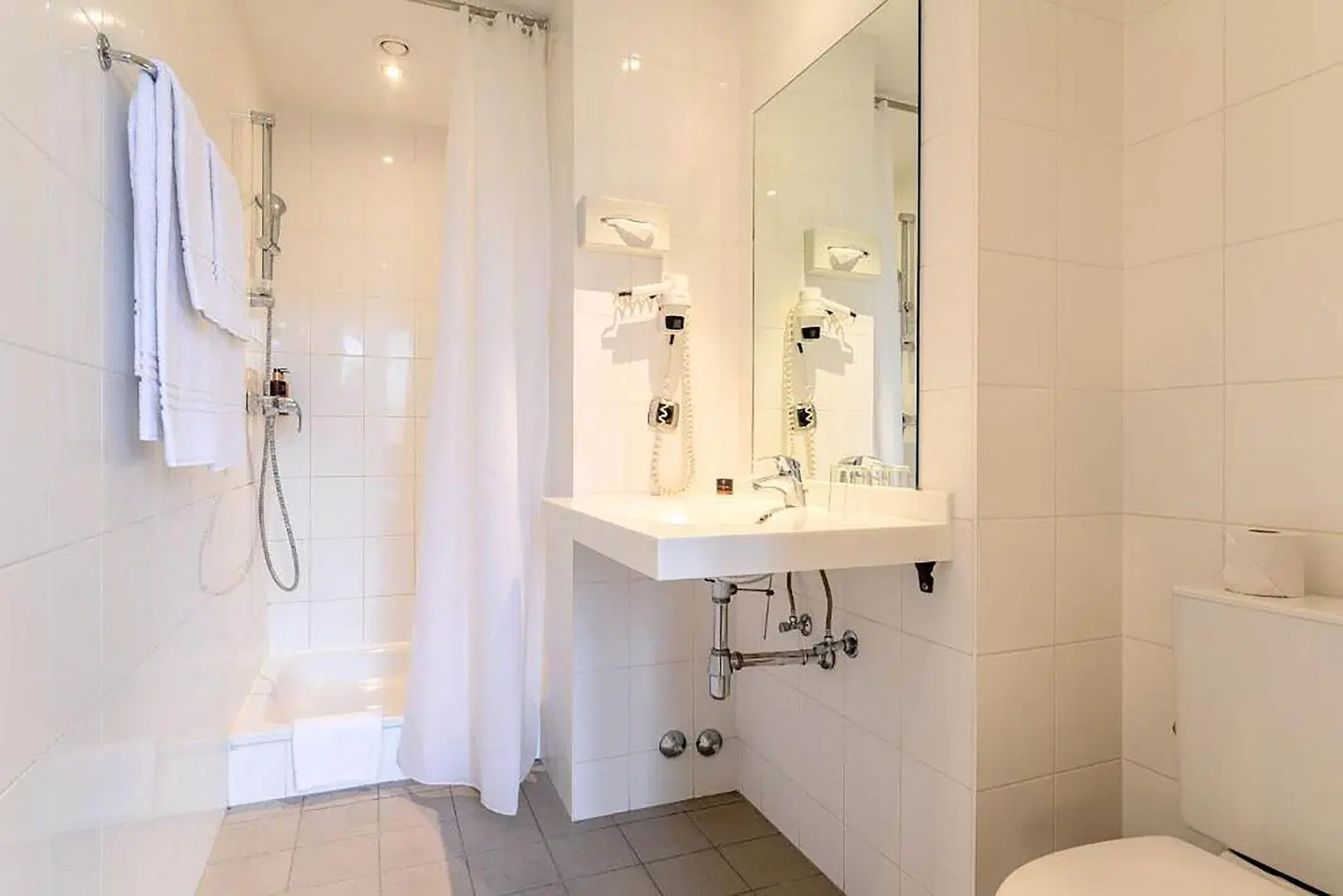 Hotel Alma Grand Place Badezimmer