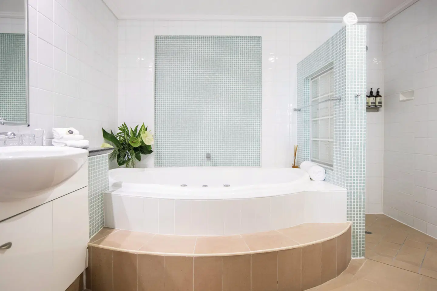 Peninsula Boutique Hotel Badezimmer