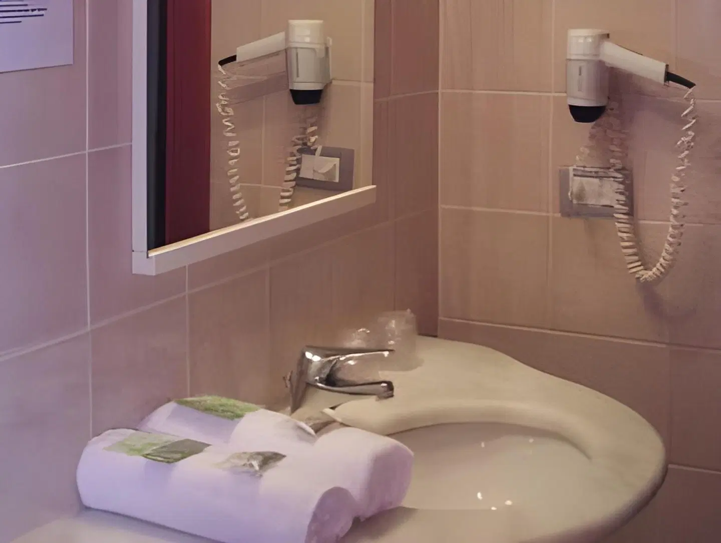 Hotel La Perla Badezimmer