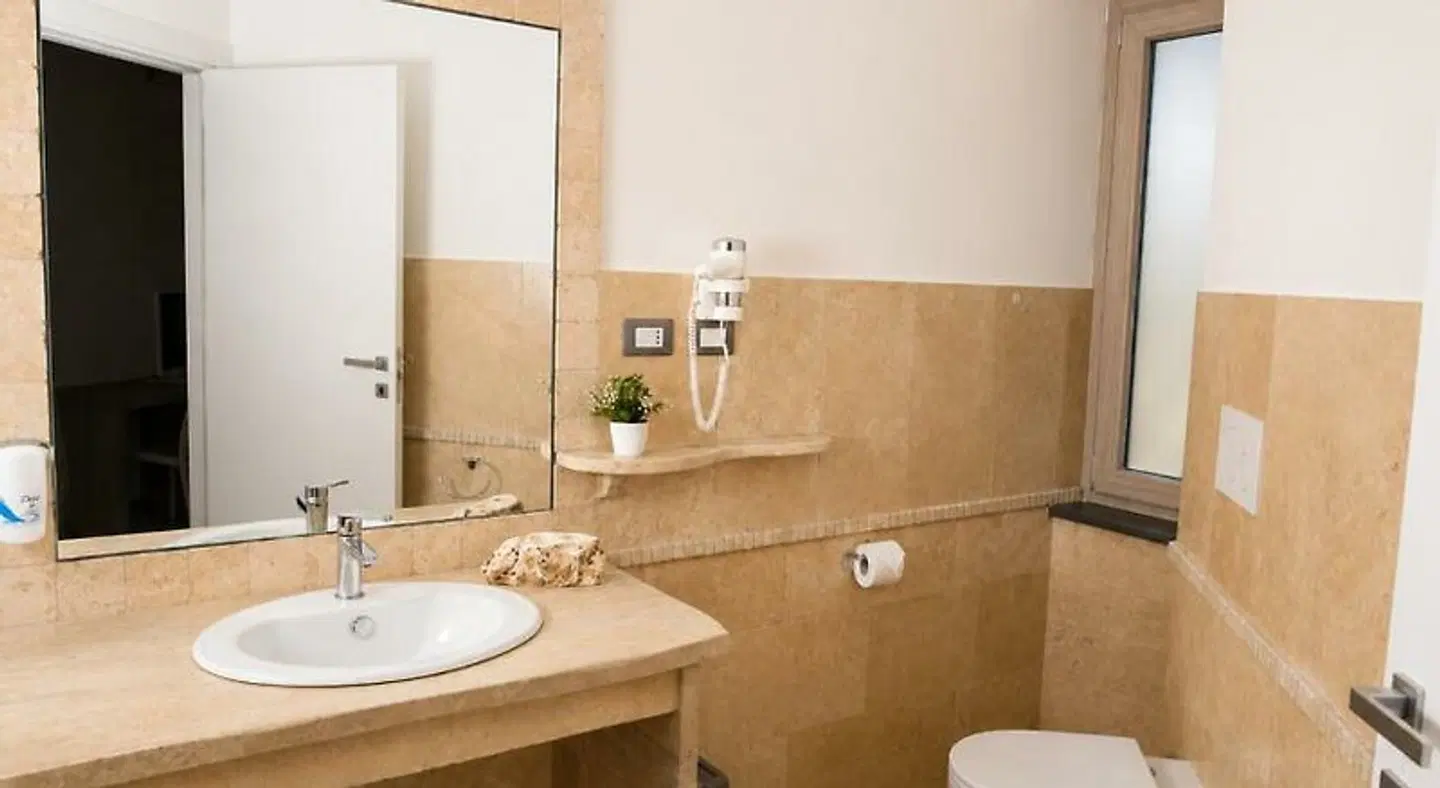 Regia Hotel Badezimmer