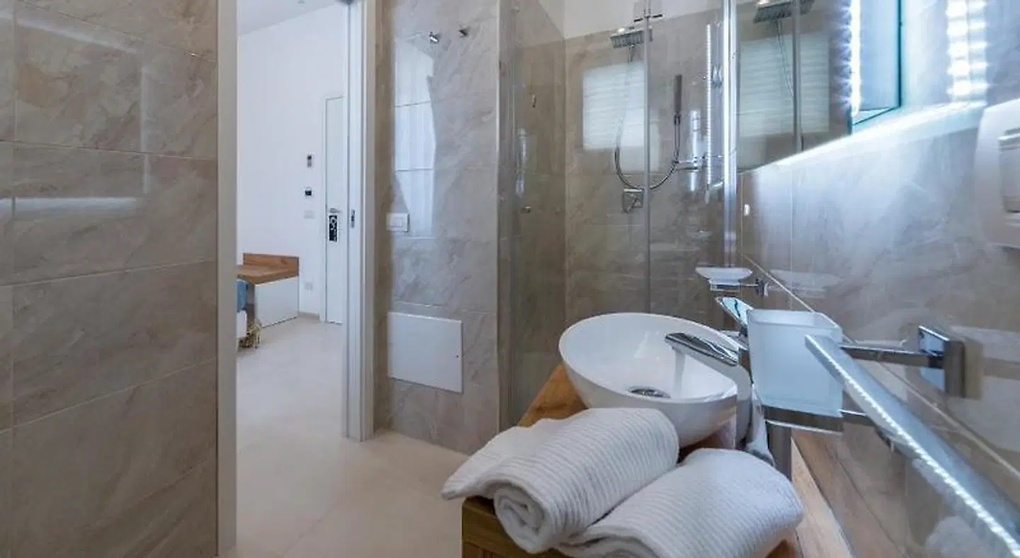 Artemide Hotel Badezimmer