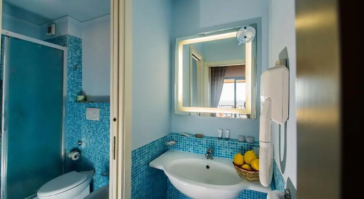 Capo dei Greci Taormina Coast- Resort Hotel & SPA Badezimmer
