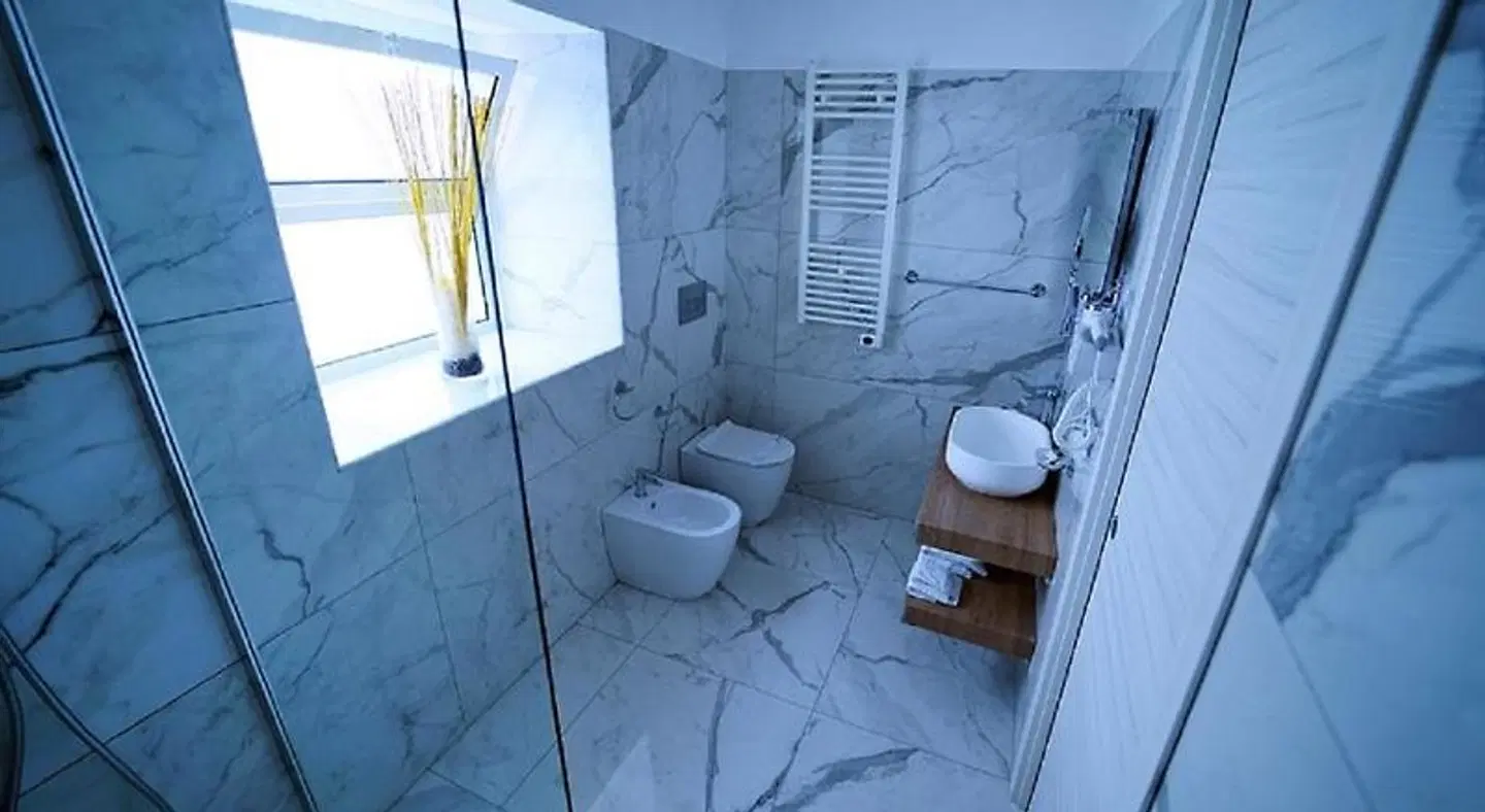 Etna Suite Rooms Badezimmer
