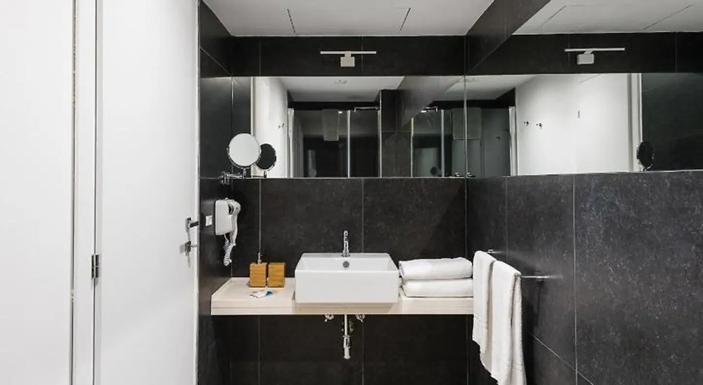 Archinuè Suite & Apartments Badezimmer