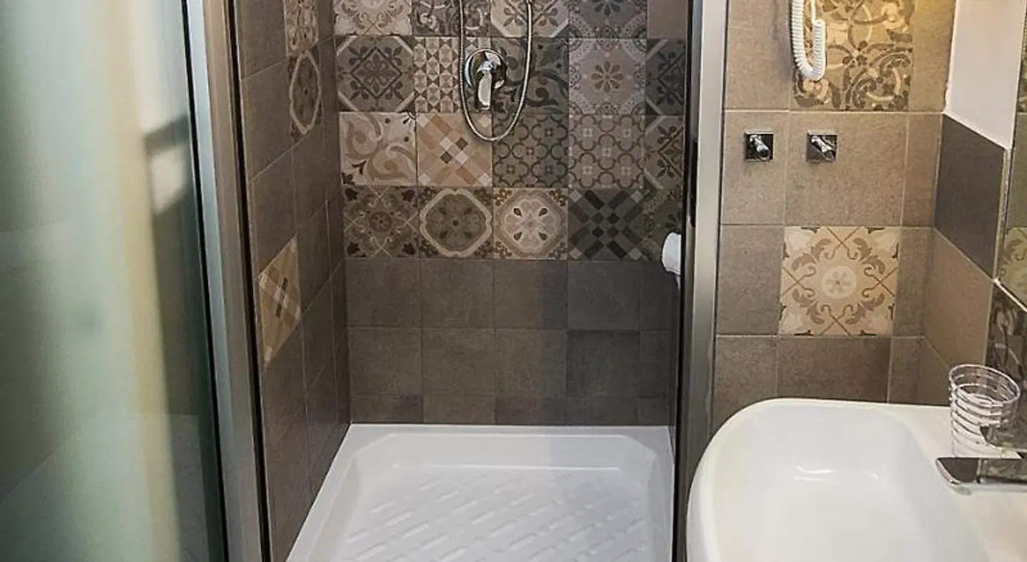 Magione del Re - sicilian rooms Badezimmer