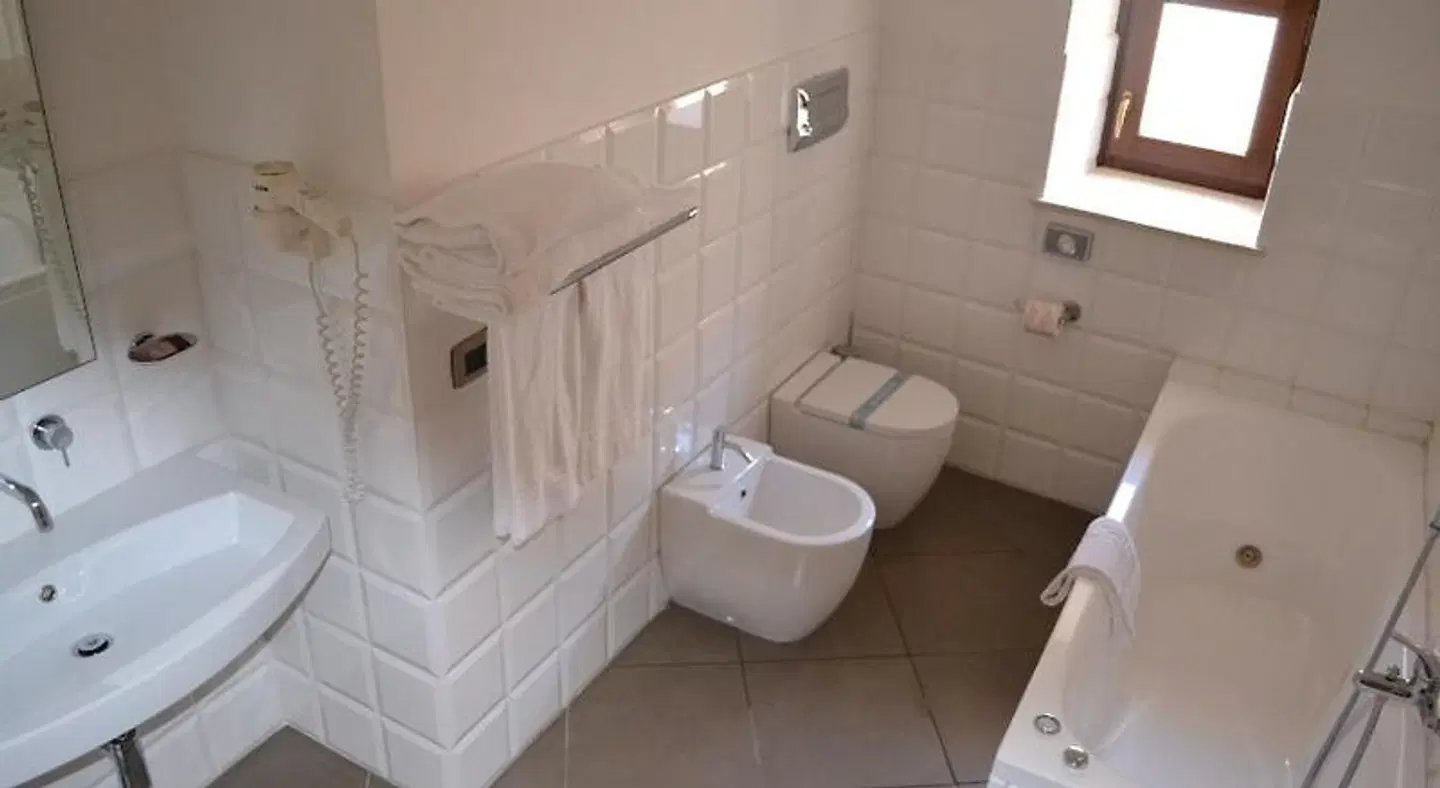 Le Magnolie Hotel Badezimmer