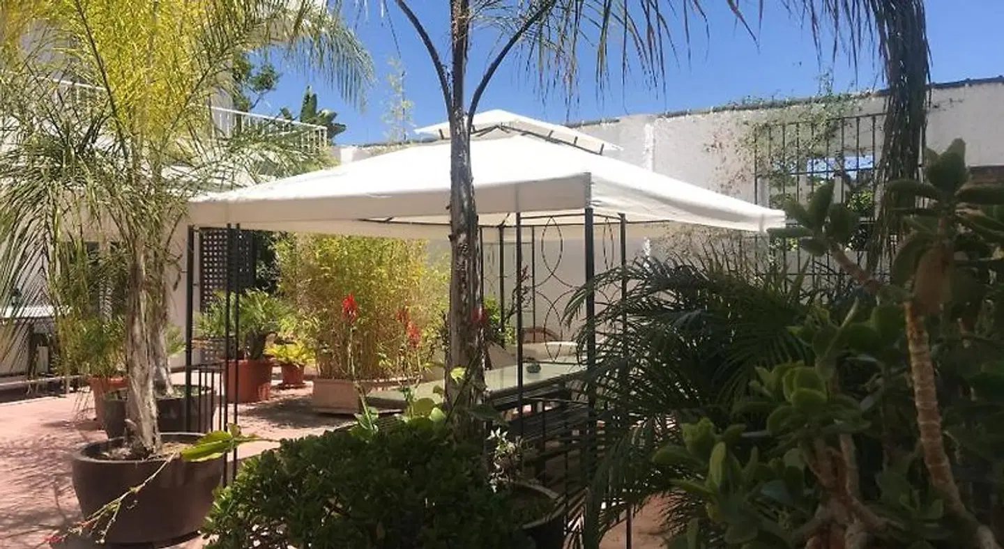 Apartamentos Turísticos La Mundial Garten