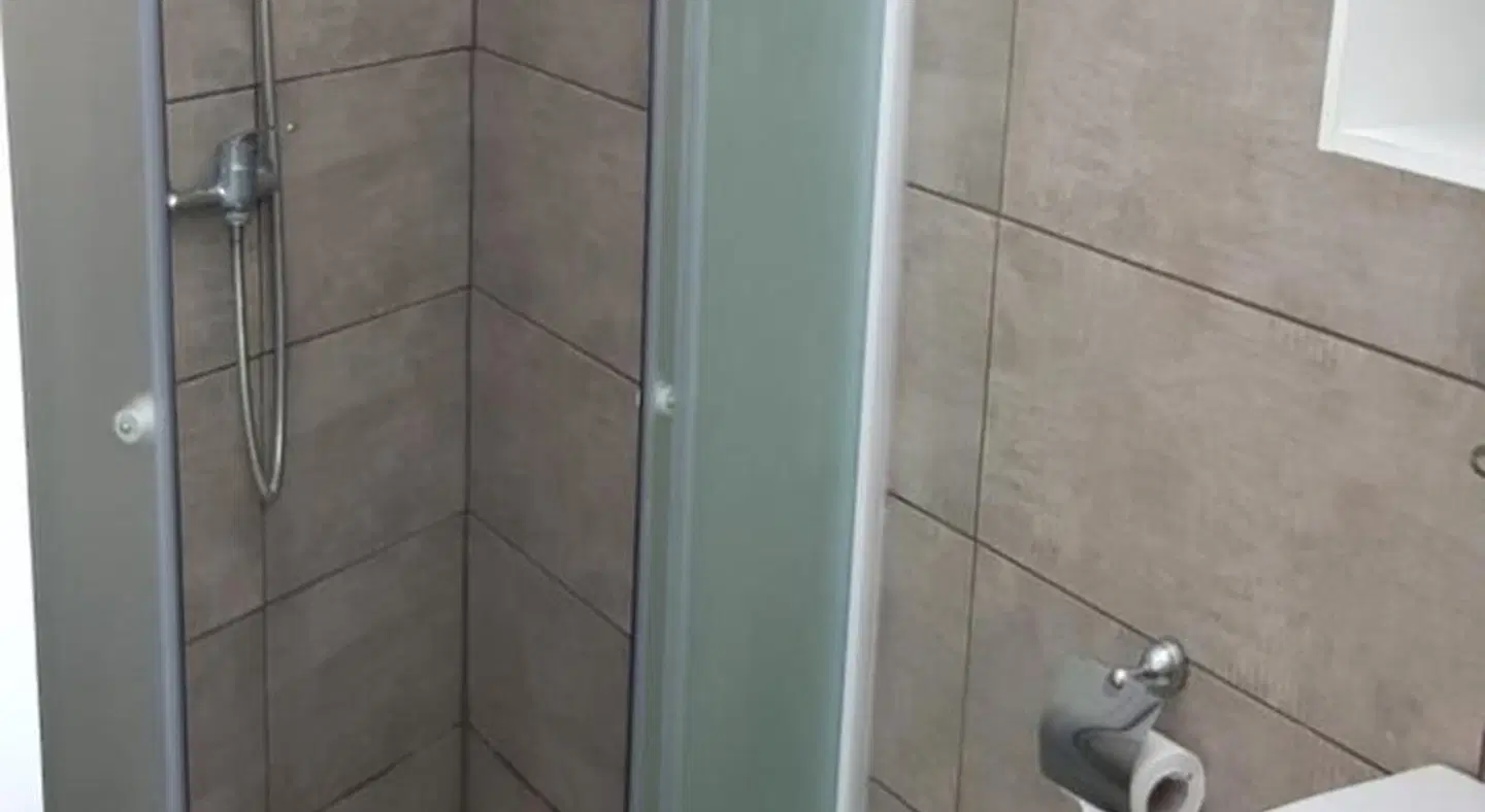 Petalmo City Apartments Badezimmer