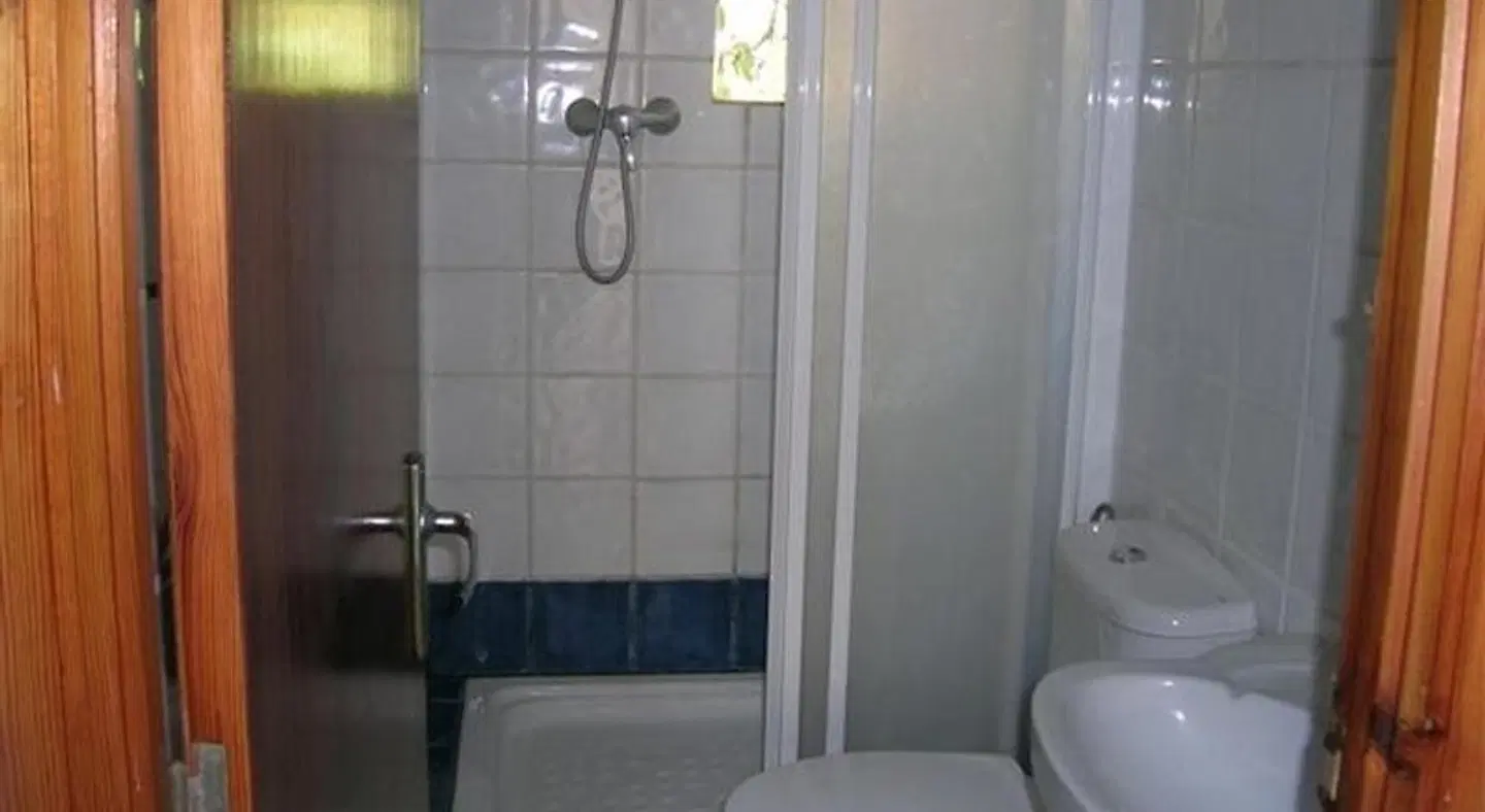 Las Tres Golondrinas Hostal Badezimmer