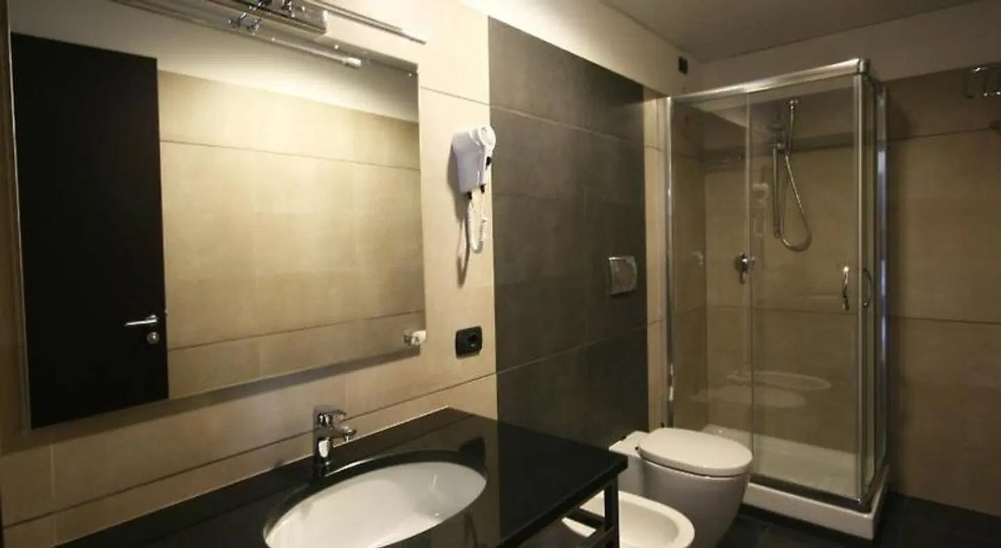 Guest House Residence Badezimmer