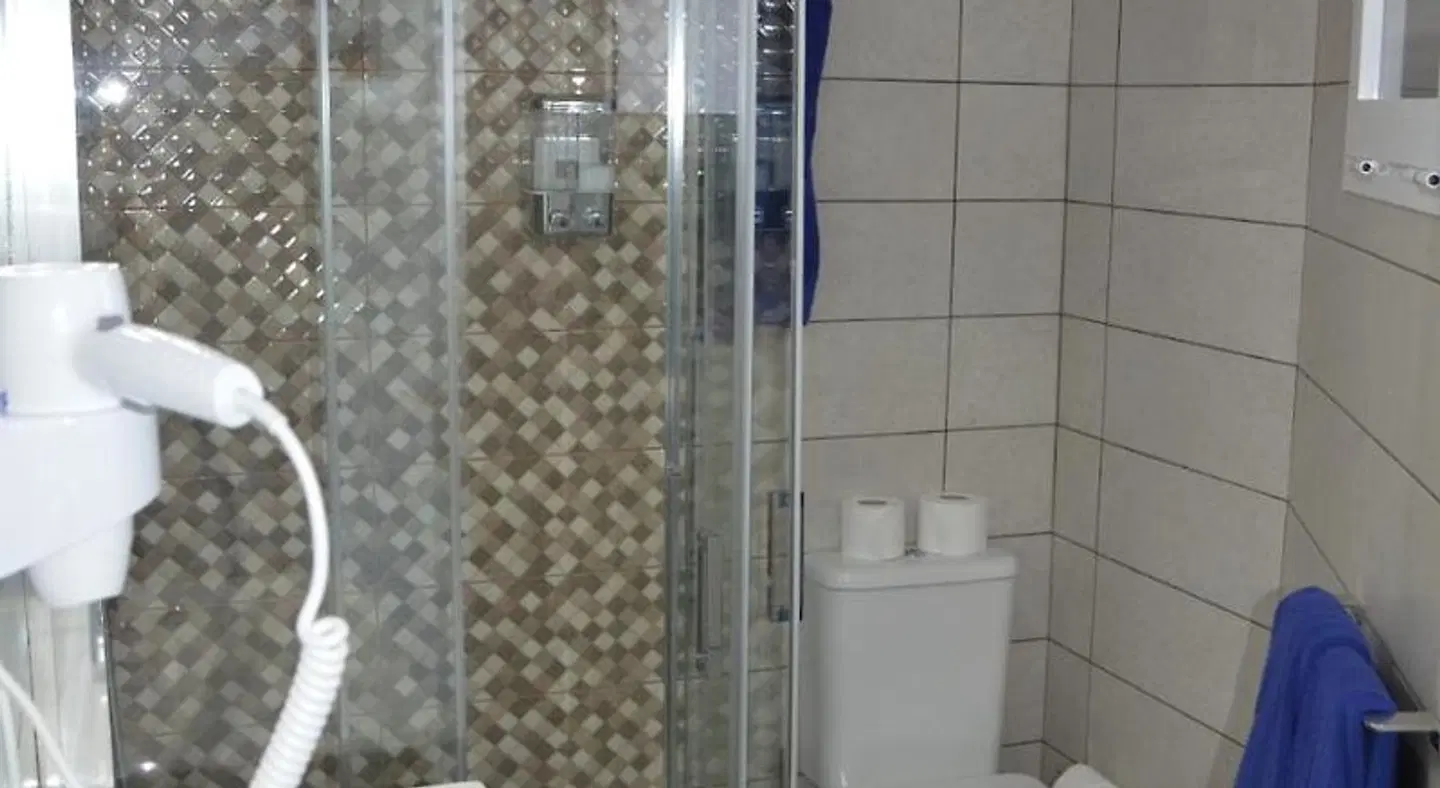 Apartamentos Koka Badezimmer