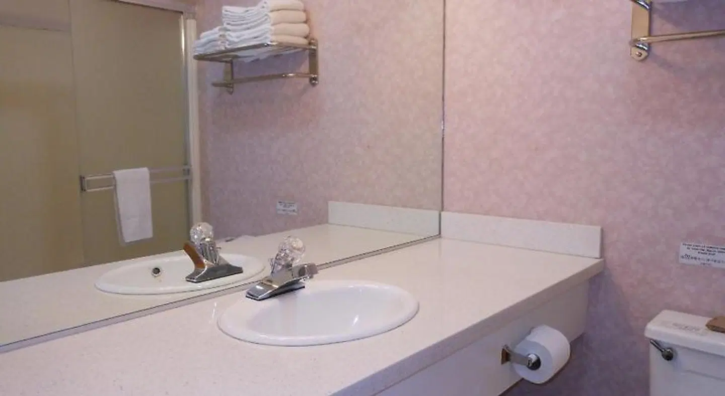 Grant Plaza Hotel Badezimmer