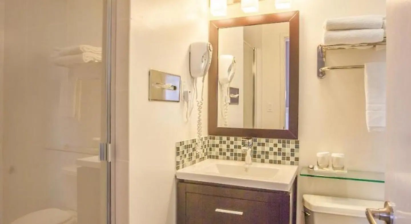 Grant Plaza Hotel Badezimmer