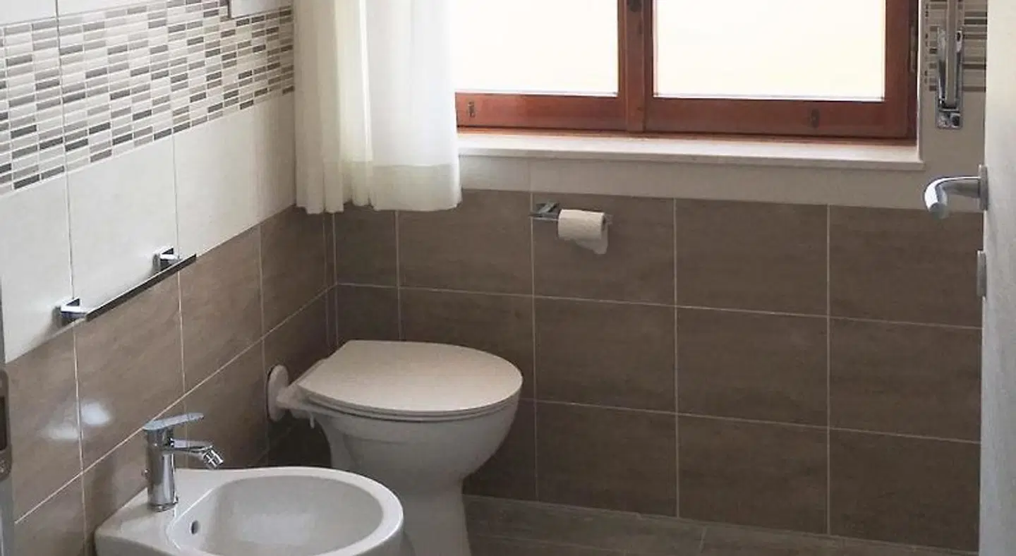 L'essenzial Living Badezimmer