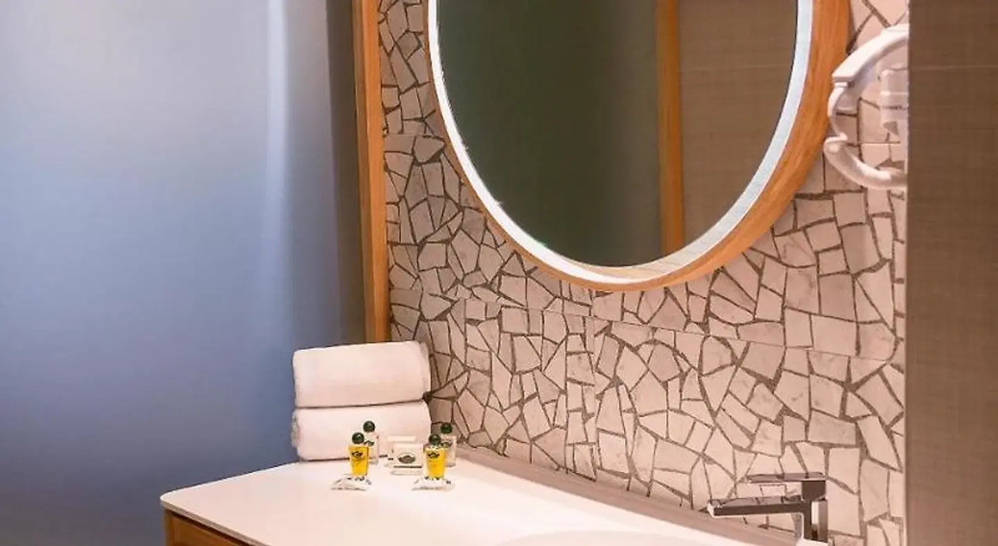 Carine Hotel Centar Badezimmer