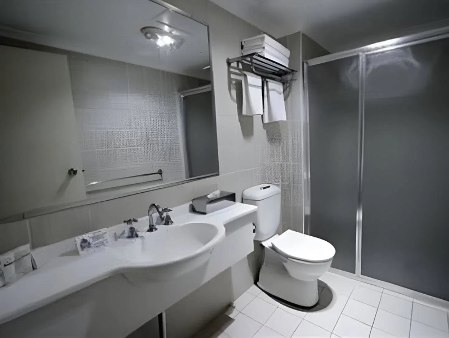 Carlyle Suites & Apartments Badezimmer
