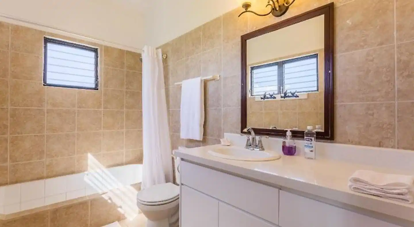 Coralito Bay Suites & Villas Badezimmer