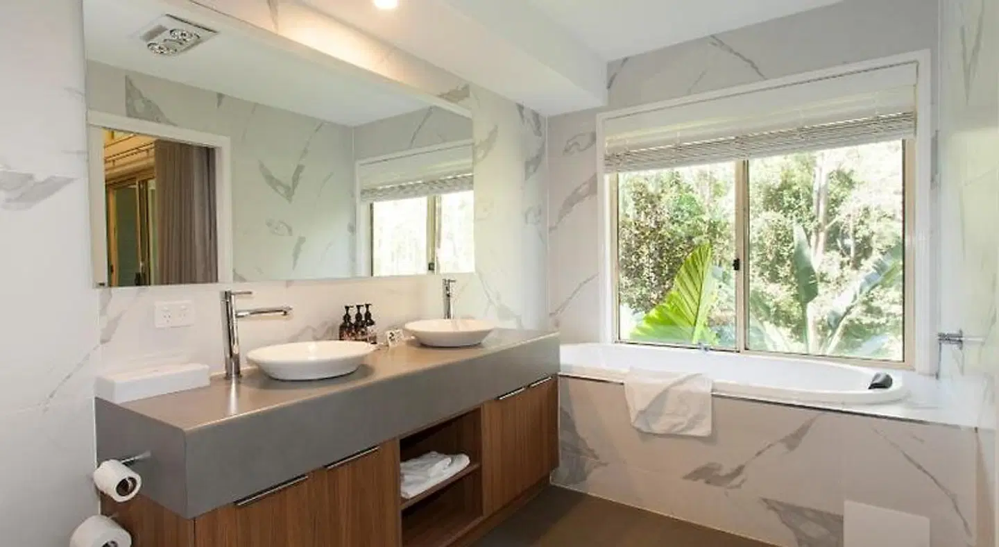 Songbirds Rainforest Retreat Badezimmer