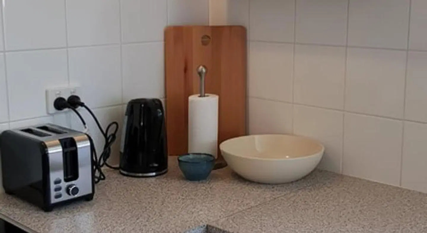 At Home Apartments Badezimmer