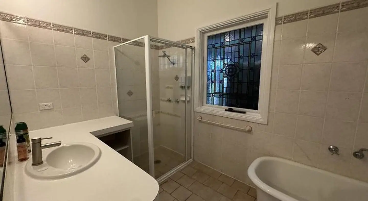 Lincoln Cottage Motor Inn Badezimmer