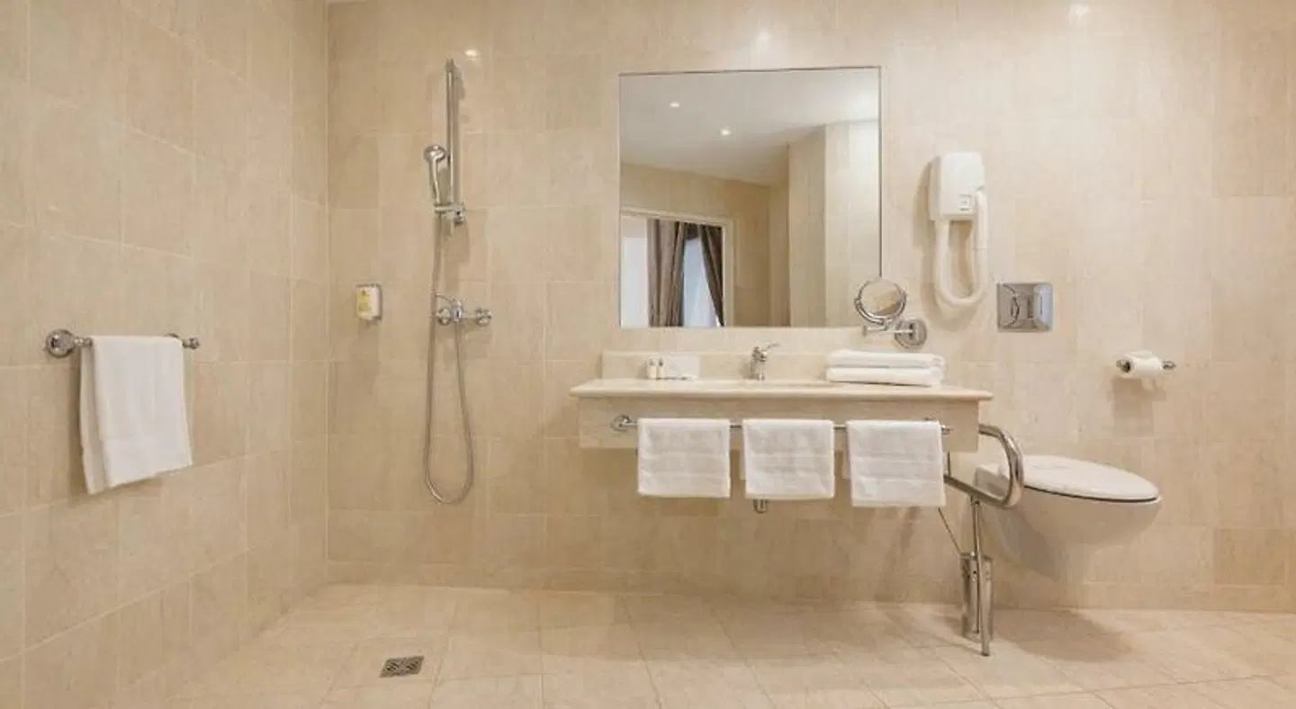 Grand Hôtel Moderne Badezimmer