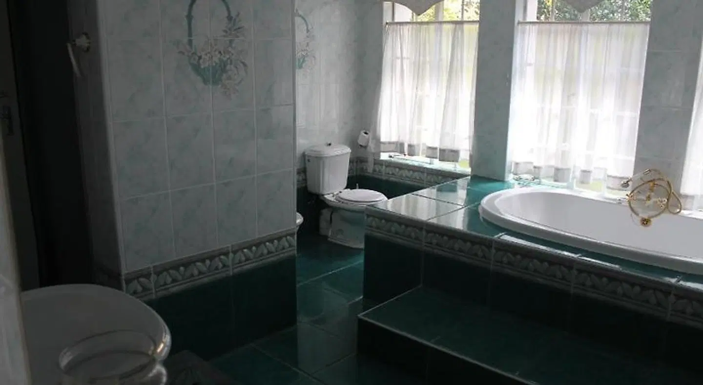 Florentia Guest House Badezimmer